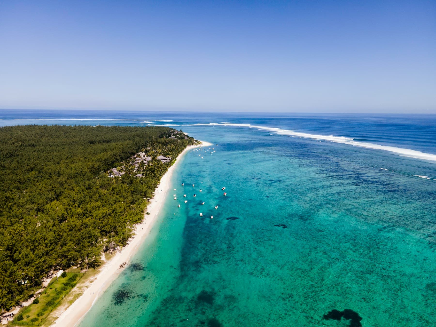 Aerial view of Le Morne beach, white sand and turquoise lagoon