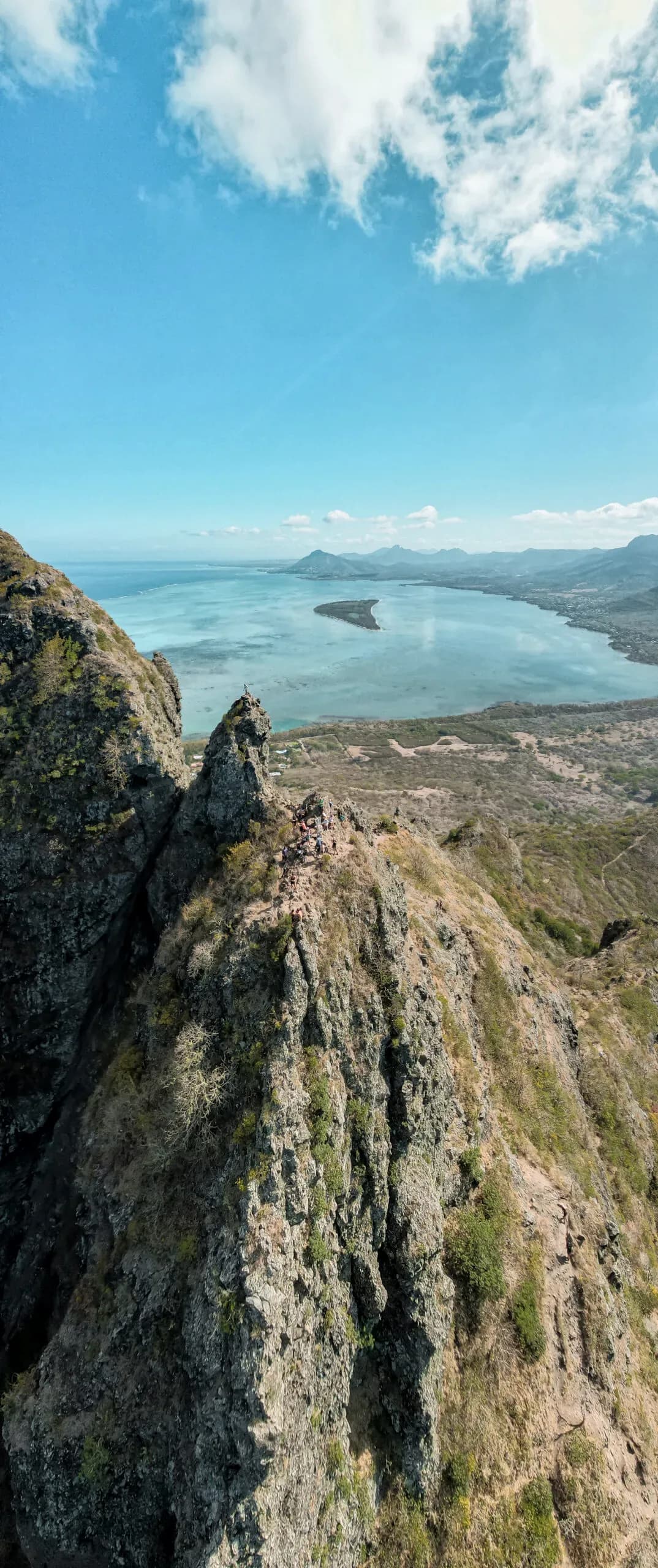 The steep upper ridge of Le Morne Brabant above the lagoon
